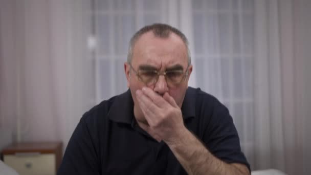 Elderly man coughing, feeling sick, illness — Stock Video