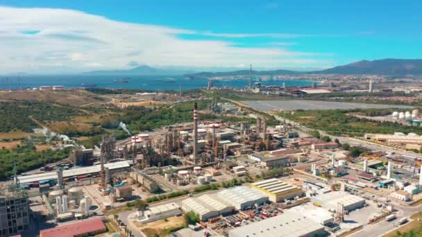 Aerial view. Oil refinery, chemical factory and power plant with many storage tanks and pipelines. — Stock Video