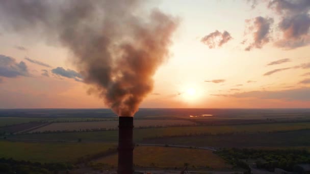 Aerial view. Pipes throwing smoke in the sky. Air pollution from Industrial plants. — Stock Video