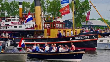 Amsterdam, Netherlands, August, 2025: Amsterdam Sail. A festival of ships from around the world sailing along the canal to Amsterdam. The festival takes place in Amsterdam every five years.
