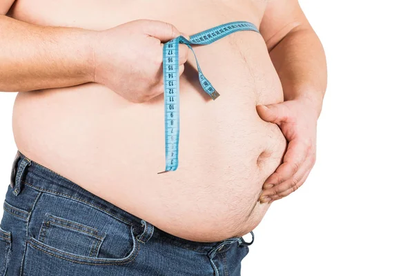 測定テープが彼の脂肪胃を測定する男 白い背景に分離 — ストック写真