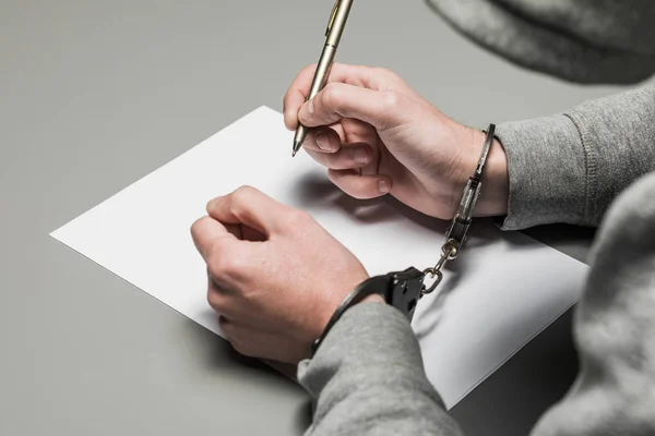 Hands Criminal Handcuffs Write Handle Paper Sincere Confession Request Statement — Stock Photo, Image