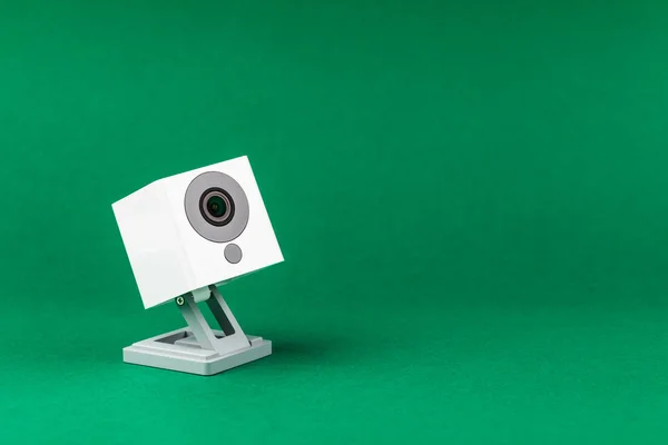 white webcam on greenbackground, object, Internet, technology concept.