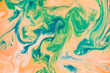 Soyut renkler, arka planlar ve dokular. Sütlü gıda boyası. Sütteki besin boyası parlak renkli soyut arka planlar yaratıyor. Renkli kimyasal deney.