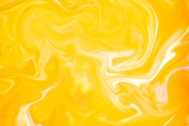 Soyut renkler, arka planlar ve dokular. Sütlü gıda boyası. Sütteki besin boyası parlak renkli soyut arka planlar yaratıyor. Renkli kimyasal deney.