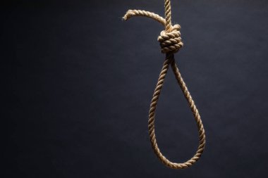 Ilmik. Cinayet ya da intihar kavramı. Koyu arka planda.