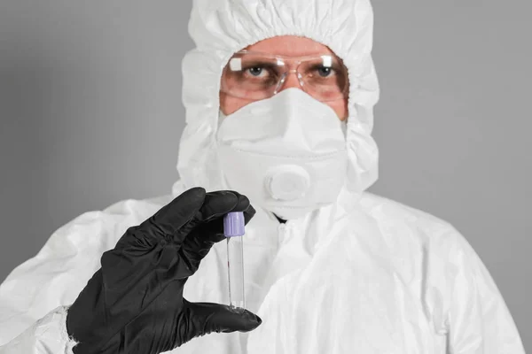Medical Scientist Policeman Wearing Protective Clothing Holds Plastic Tube His — Stock Photo, Image