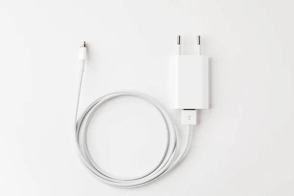 white USB and micro-USB cable isolated on white background