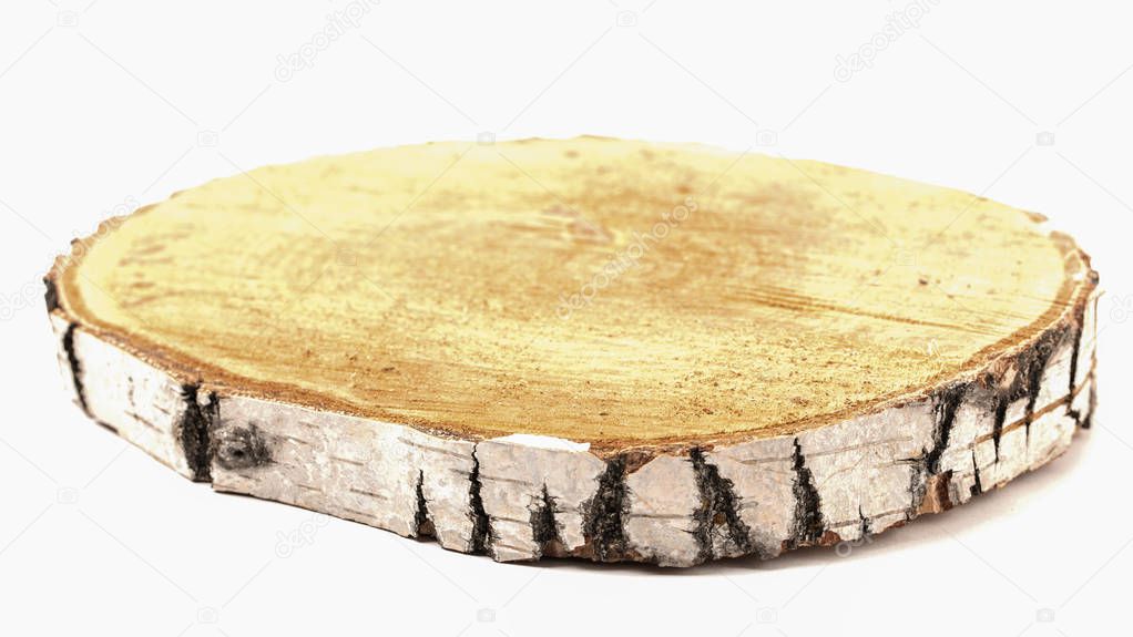 cut tree on white background. wooden tray.
