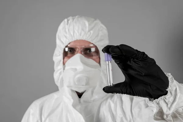 A medical scientist or a policeman wearing protective clothing h — Stock Photo, Image