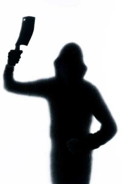 Homem perigoso atrás de vidro fosco com uma faca na mão. Hal... — Fotografia de Stock