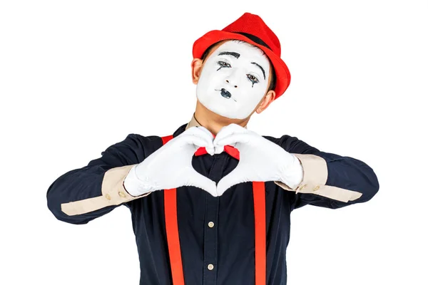 Porträtt av en man, konstnär, clown, MIME. Visar ett hjärta isolerat på — Stockfoto