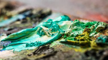 Parlak yağlı boya paletinin arkaplan resmi.