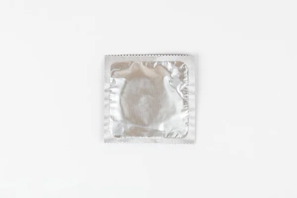 Background of condoms. condoms on a white background — Stock Photo, Image