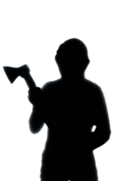 Dangerous man behind frosted glass with an axe in his hand. Hall — Stock Photo, Image