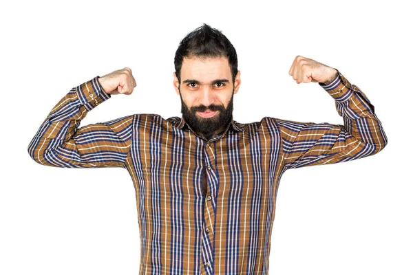 Portret van een tevreden jonge man viert succes geïsoleerd o — Stockfoto