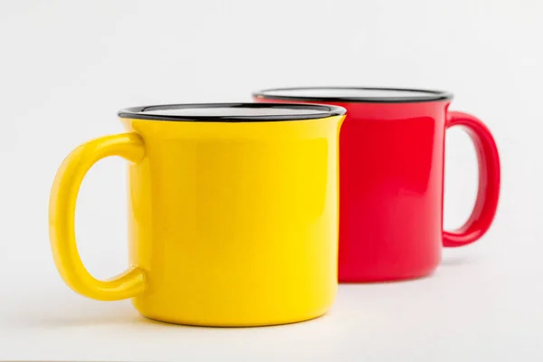 Enameled iron mug, on white background. — Stock Photo, Image