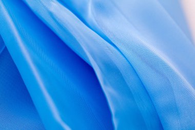 blue satin fabric texture for the background.