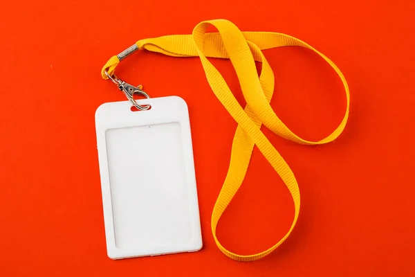 Work ID name tag. The ID of the employee. Card icons with ropes on a red background