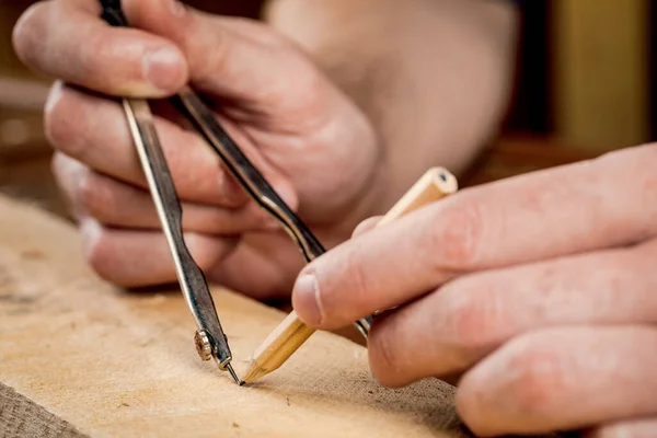 Close Male Carpenter Marks Metal Compass Pencil Wooden Bar — Stock Photo, Image