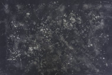 Siyah doku arka planı için kullanılabilir. Karanlık doku bir desen ile. Siyah ve gri noktalar. En iyi manzaralı.