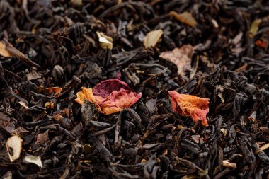 Kuru meyve kiraz çay yaprak doku arka plan. Makro. Üstten görünüm.