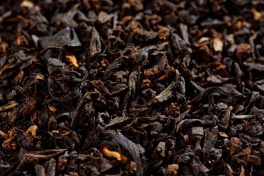 Arka plan doku loos yaprak İngiliz kahvaltısı siyah çay Hindistan'dan. Assam. Çay içmek kavramı. Makro. Üstten görünüm.