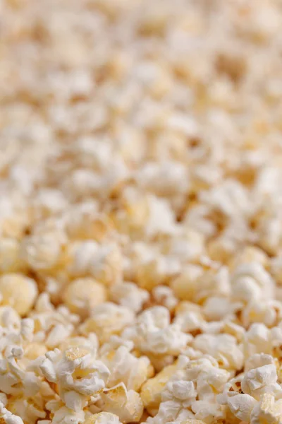 Texture of salted popcorn close up. Oscar Film Academy Concept. Snacks and food to watch the movie.