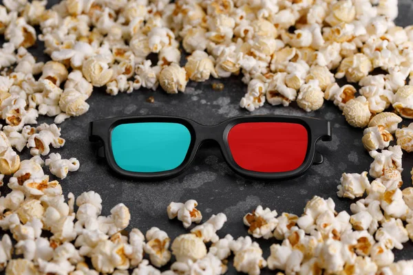 glasses 3d to watch a movie surrounded by popcorn. Cinema concept.