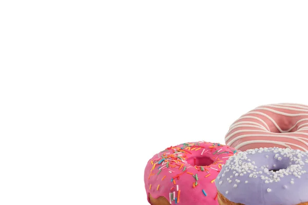 Donuts saborosos brilhantes diferentes em um fundo branco. Coloque sob o texto. Diversidade . — Fotografia de Stock