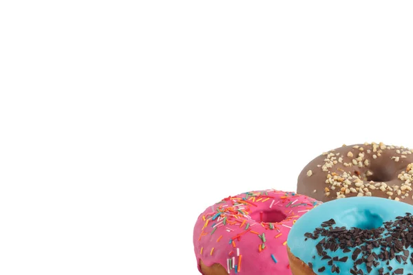Donuts saborosos brilhantes diferentes em um fundo branco. Coloque sob o texto. Diversidade . — Fotografia de Stock