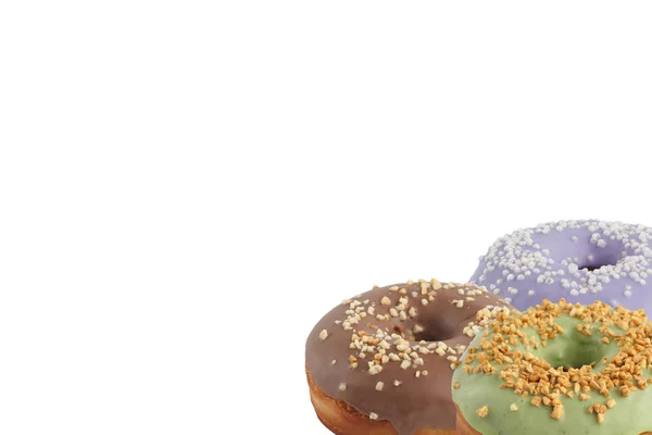 Verschillende heldere smakelijke donuts op een witte achtergrond. Plaats onder de tekst. Diversiteit. — Stockfoto