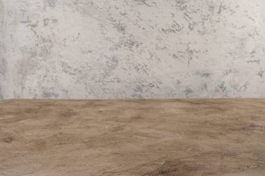 Soyut bulanık arkaplanın önündeki dokuma tablosunun resmi. Mevcut ürün için arkaplan üzerine boş doku tablosu platformu.