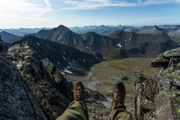 The concept of outdoor activities in the mountains. Minimalist mountain landscape. Atmospheric view. The majestic nature of the Circumpolar Urals. Hiking.