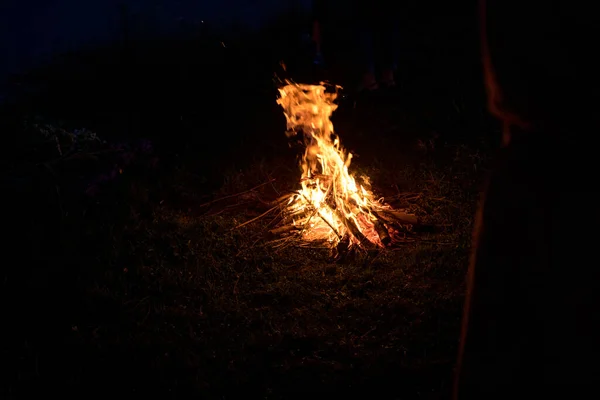 Lovely girls by the fire at night. Ancient pagan origin celebration concept. Night of Ivan Kupala.