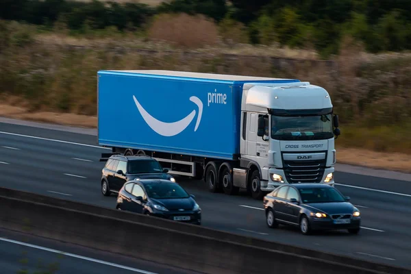 Watford, UK - July 22, 2018: Lorry belonging to Amazon, in motion on the British motorway M1