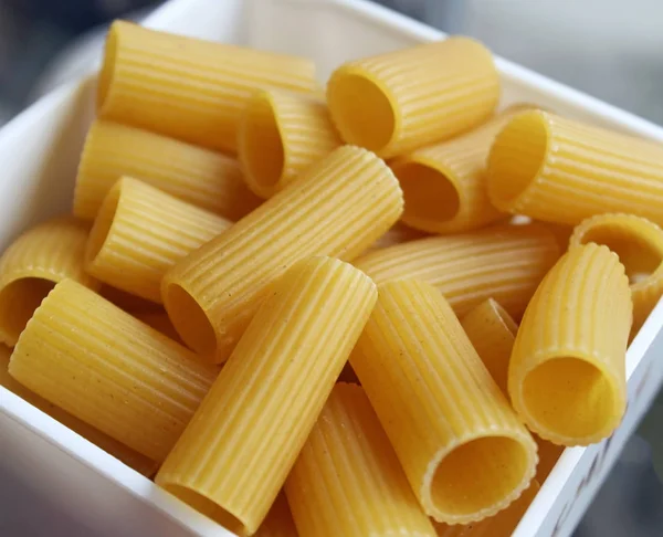 Measured Portion Dry Uncooked Rigatoni Pasta — Stock Photo, Image