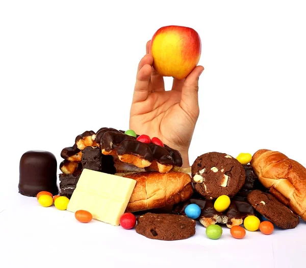 Eine Hand Kommt Durch Einen Haufen Süßigkeiten — Stockfoto