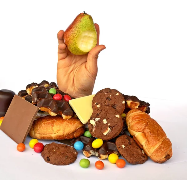 Eine Hand Kommt Durch Einen Haufen Süßigkeiten — Stockfoto