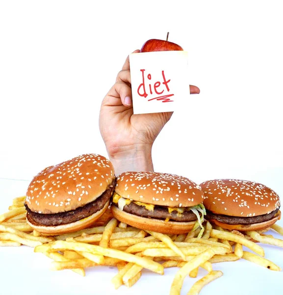 Hand Uit Een Bos Van Fast Food — Stockfoto