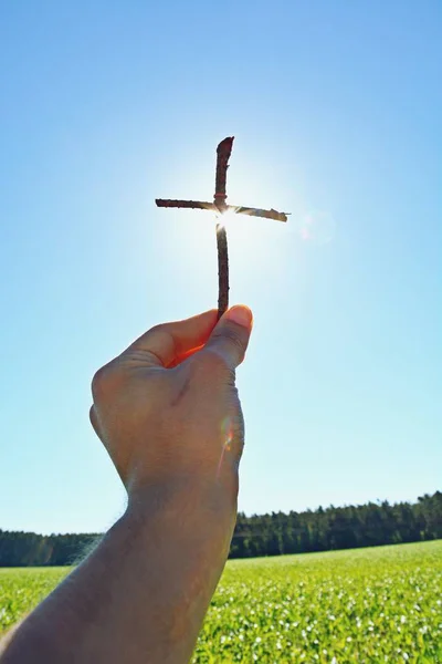 Holding Wooden Cross Close — Stock Photo, Image