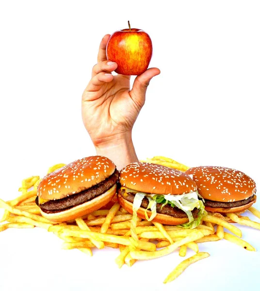 Hand Uit Een Bos Van Fast Food — Stockfoto