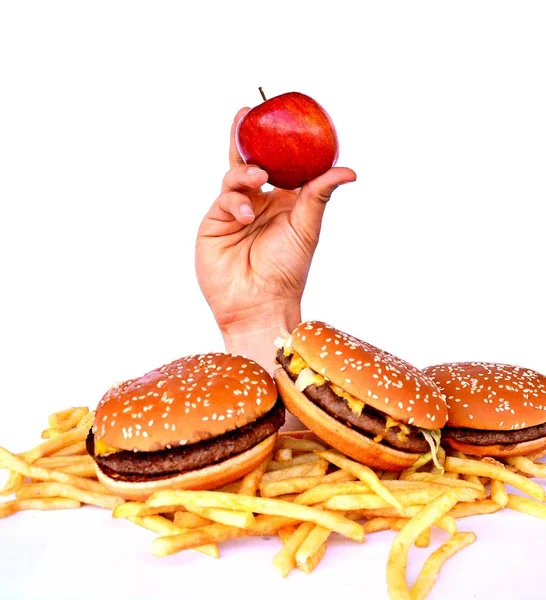 Hand Uit Een Bos Van Fast Food — Stockfoto