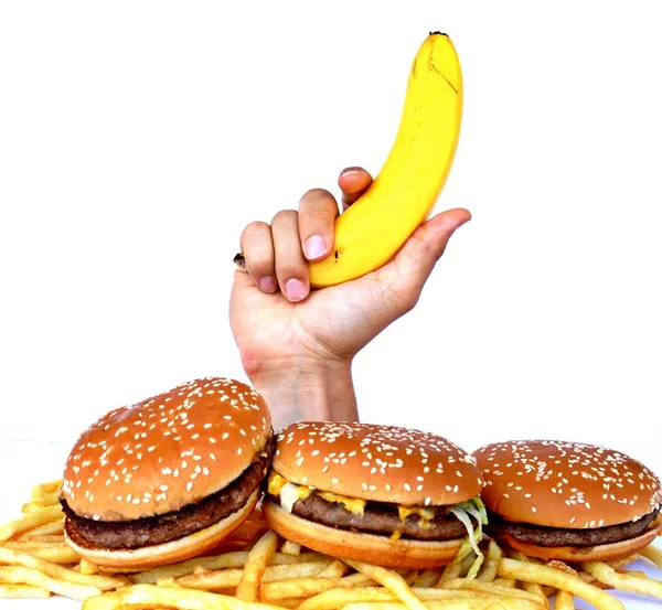 Hand Aus Einem Bündel Fast Food — Stockfoto