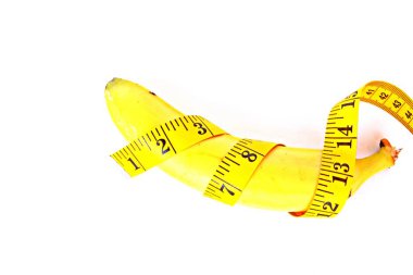 measure tape and banana close up  clipart