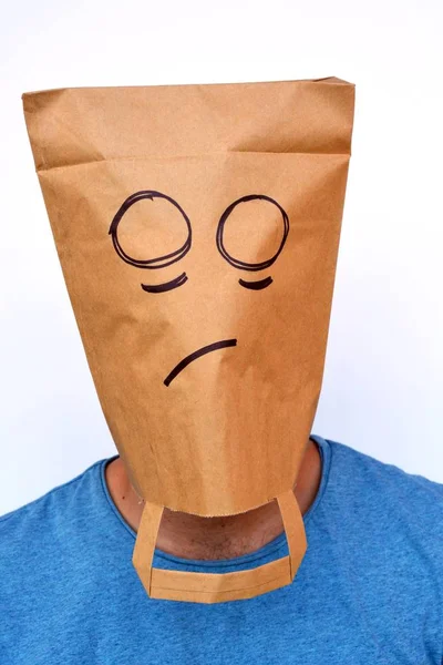 paper bag over the head with smile on it