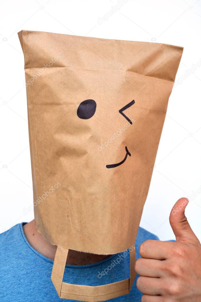 paper bag over the head with smile on it 