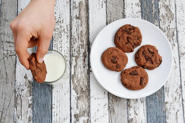 eat cookies and drink milk - close up from above