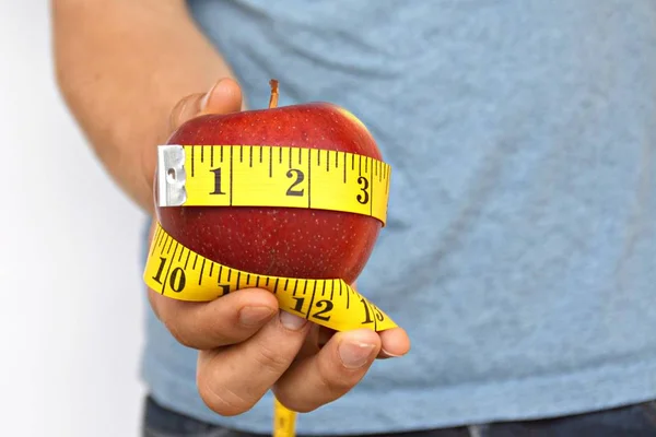 Holding Apple Wrapped Measuring Tape Hand — Stock Photo, Image