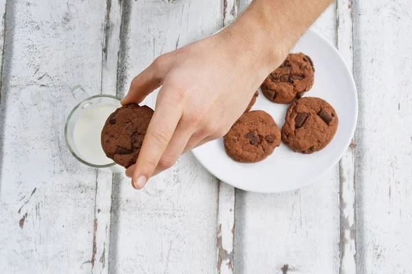 eat cookies and drink milk - close up from above